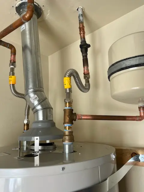 Water heater installation and plumbing repair in Nevins